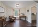 Cozy sitting room with hardwood floors, natural light, and a comfortable armchair, perfect for relaxing at 303 Ridge Reserve Dr # 29, Clover, SC 29710