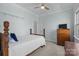 Cozy bedroom with soft blue walls, ceiling fan and carpeted floors at 3208 Fifth Baxter Xing, Fort Mill, SC 29708