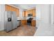 Well-equipped kitchen featuring stainless steel appliances, ample cabinetry, and a pantry at 3208 Fifth Baxter Xing, Fort Mill, SC 29708