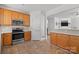 Modern kitchen with stainless steel appliances, ample counter space, and a convenient pantry at 3208 Fifth Baxter Xing, Fort Mill, SC 29708