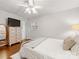 Bedroom featuring hardwood floors, light walls and ceiling fan with lighting at 3350 Bonneville Dr, Charlotte, NC 28205