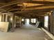 Interior view showcases a gutted living room ready for renovation and customization at 349 N Kendall N St, Norwood, NC 28128