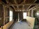 Sunlight streams through windows, highlighting the potential of this renovation project at 349 N Kendall N St, Norwood, NC 28128