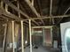Exposed framing and ceilings provide a glimpse into the renovation potential of this space at 349 N Kendall N St, Norwood, NC 28128