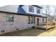 Well-designed backyard with a wooden deck, brick exterior, and black trim, offering a serene outdoor space at 4060 Steve Ikerd Ne Dr, Hickory, NC 28601