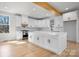 Bright, updated kitchen with a large center island, stainless appliances, and modern white cabinets at 4060 Steve Ikerd Ne Dr, Hickory, NC 28601