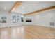Bright living room featuring hardwood floors and modern fireplace at 4060 Steve Ikerd Ne Dr, Hickory, NC 28601