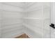 Walk-in pantry offers ample storage with wire shelving, perfect for organized kitchen essentials at 4060 Steve Ikerd Ne Dr, Hickory, NC 28601