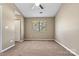 Comfortable bedroom featuring neutral walls, carpeted floor and natural light at 4139 N Course Dr, Charlotte, NC 28277