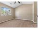 Cozy bedroom with natural light, a ceiling fan and neutral color scheme at 4139 N Course Dr, Charlotte, NC 28277