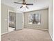 Bright bedroom showcasing plush carpeting and a window with natural light at 4139 N Course Dr, Charlotte, NC 28277