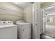 Laundry room with a modern washer and dryer set for convenient chore management at 4139 N Course Dr, Charlotte, NC 28277