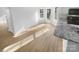 The open-concept kitchen features stainless steel appliances, granite countertops, and a breakfast nook at 4219 Robinwood Dr, Charlotte, NC 28212