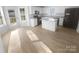Bright kitchen boasts an island, granite counters, stainless appliances and ample cabinet space at 4219 Robinwood Dr, Charlotte, NC 28212
