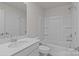 Bathroom features a shower-tub combo, white vanity and tile flooring at 4720 Maiden Creek Way, Maiden, NC 28650