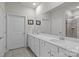 Bright bathroom features double sinks, white cabinets, and a large mirror at 4720 Maiden Creek Way, Maiden, NC 28650