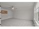 Spacious bonus room offers neutral carpeting, ceiling fan and natural light at 4720 Maiden Creek Way, Maiden, NC 28650