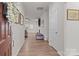 Bright foyer showcases wood flooring, fresh white walls, and a view into the adjacent living room at 4720 Maiden Creek Way, Maiden, NC 28650