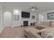 Comfortable living room with a fireplace, built-in shelving, and an open layout at 4720 Maiden Creek Way, Maiden, NC 28650