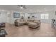 Open-concept living room features wood flooring, neutral tones, and seamless flow to the kitchen at 4720 Maiden Creek Way, Maiden, NC 28650