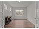 Bright office space with natural light, wood floors, and a large window with backyard views at 4720 Maiden Creek Way, Maiden, NC 28650