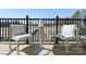 Inviting balcony with comfortable seating and a view of the neighborhood street at 5723 Castlerea Dr, Charlotte, NC 28217