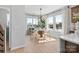 Bright dining area with modern chandelier and an abundance of natural light at 5723 Castlerea Dr, Charlotte, NC 28217