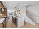 Well-lit kitchen showcasing stainless steel appliances and an open-concept layout at 5723 Castlerea Dr, Charlotte, NC 28217
