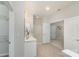 Bathroom featuring vanity, walk in shower, and access to main bedroom at 620 Amethyst Cir, Fort Mill, SC 29708