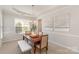 Cozy dining area featuring a stylish table set with seating, complemented by neutral decor and ample light at 620 Amethyst Cir, Fort Mill, SC 29708