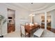 Elegant dining room featuring wood table, stylish bench, and sophisticated decor at 620 Amethyst Cir, Fort Mill, SC 29708