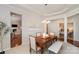 Elegant dining room featuring wood table, stylish bench, and sophisticated decor at 620 Amethyst Cir, Fort Mill, SC 29708