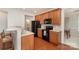 Well-equipped kitchen with black appliances and wood cabinets at 620 Amethyst Cir, Fort Mill, SC 29708