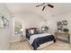 Comfortable bedroom with vaulted ceiling, plush carpet, and ample natural light at 620 Amethyst Cir, Fort Mill, SC 29708