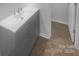 Bathroom features modern vanity and flooring with natural light and sleek design at 6809 Brancusi Ct, Charlotte, NC 28215