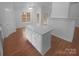 Spacious kitchen with an island offers ample counter space and room to entertain at 6809 Brancusi Ct, Charlotte, NC 28215
