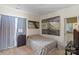 Cozy bedroom featuring neutral decor, carpet, and artwork, creating a comfortable retreat at 732 Ellsworth Rd, Charlotte, NC 28211