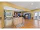 Large space with hardwood floors, an island, and ample space for furniture or activities at 732 Ellsworth Rd, Charlotte, NC 28211