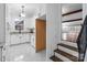 Bright kitchen with white cabinets, stainless steel sink, and granite countertops at 805 East St, Albemarle, NC 28001