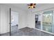 A sunroom shows access to additional rooms and backyard through glass doors at 805 East St, Albemarle, NC 28001