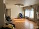 Bright living room with hardwood floors, classic details, and lots of natural light from large windows at 816 Horah W St, Salisbury, NC 28144