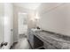 Bathroom featuring a countertop, basin, and gray cabinets at 822 Bethlehem Rd, Kings Mountain, NC 28086