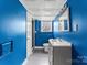 Basement bathroom features an enclosed shower and white solid surface sink at 822 Bethlehem Rd, Kings Mountain, NC 28086