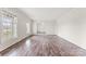 Bright living room featuring gleaming hardwood floors and large windows at 822 Bethlehem Rd, Kings Mountain, NC 28086