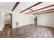 Open living room with beams, fireplace, and lots of space to relax at 822 Bethlehem Rd, Kings Mountain, NC 28086