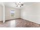 Bright room with hardwood floors, paneled walls, and natural light at 822 Bethlehem Rd, Kings Mountain, NC 28086