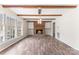 Bright living room features a brick fireplace and ample space for entertaining at 822 Bethlehem Rd, Kings Mountain, NC 28086