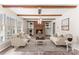 Inviting living room features a brick fireplace, built-in shelves, and exposed wood beams creating a warm ambiance at 822 Bethlehem Rd, Kings Mountain, NC 28086