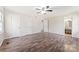 Primary bedroom with wood floors and ensuite bathroom entrance at 822 Bethlehem Rd, Kings Mountain, NC 28086