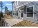Charming home featuring a concrete patio and fenced yard, perfect for outdoor living and privacy at 8233 Houser St, Cornelius, NC 28031